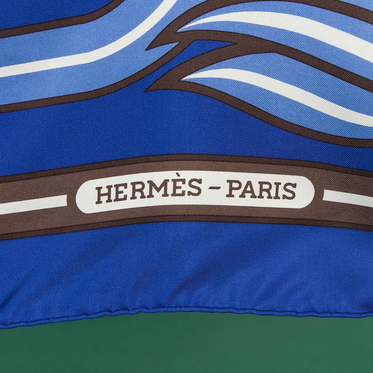 A SCARF, by HERMÈS.