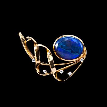 15. A BROOCH, black opal 15 x 18 mm, 4 x 8/8 cut diamonds 0.15 ct.