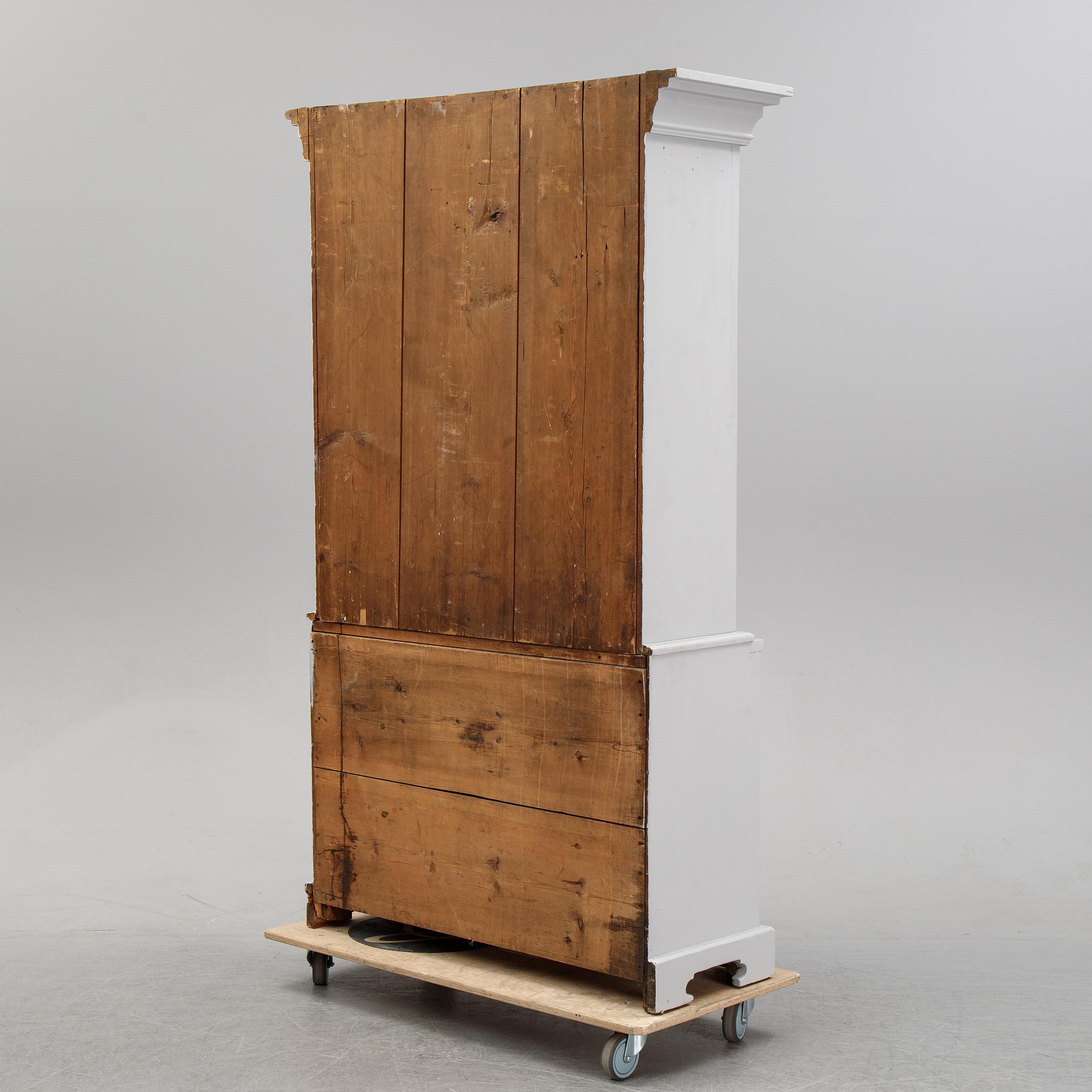 A 18/19th Century painted cabinet.