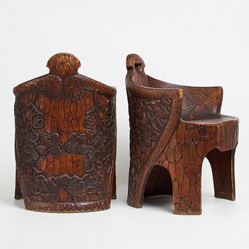 Gustaf Fjaestad, a pair of Art Nouveau carved pine chairs "stabbestolar", Arvika Sweden 1908-1909.