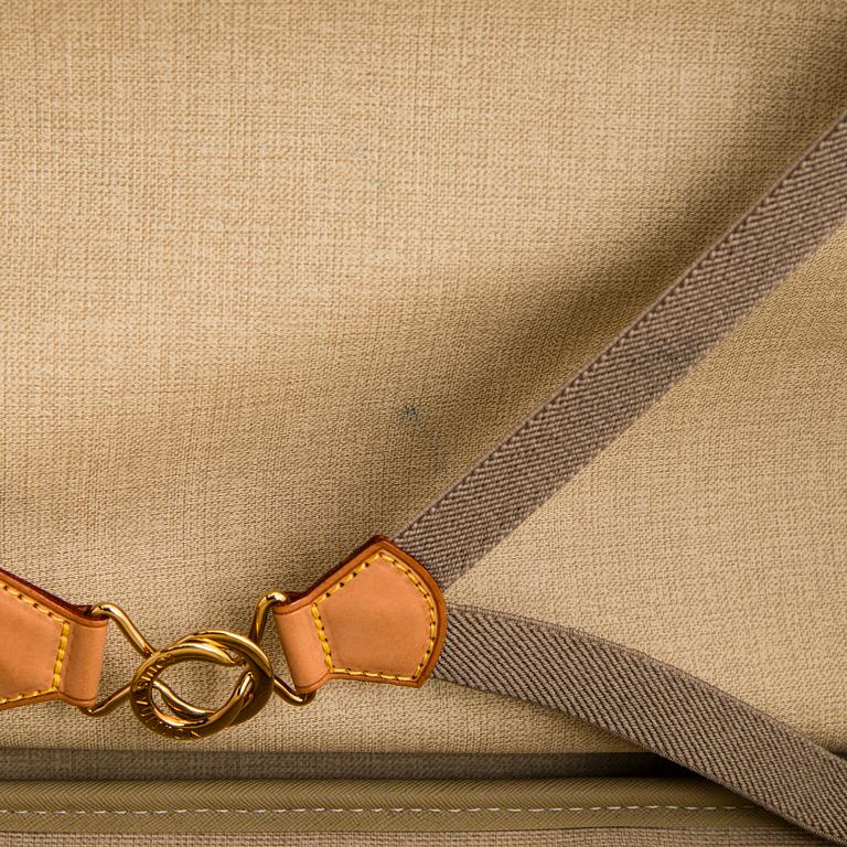 Louis Vuitton, a Monogram Canvas 'Sac Alize 3' soft suitcase.