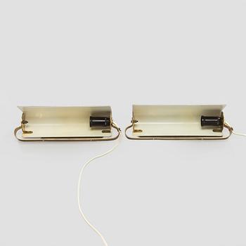 A pair of mid-20th century model 2317 wall lights by Valinte.