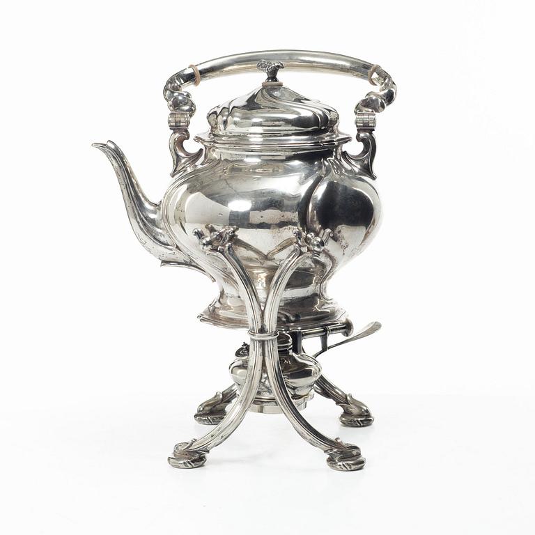 Silver teapot on a réchaud, Rococo style, Swedish import mark CF Carlman, Stockholm 1916.