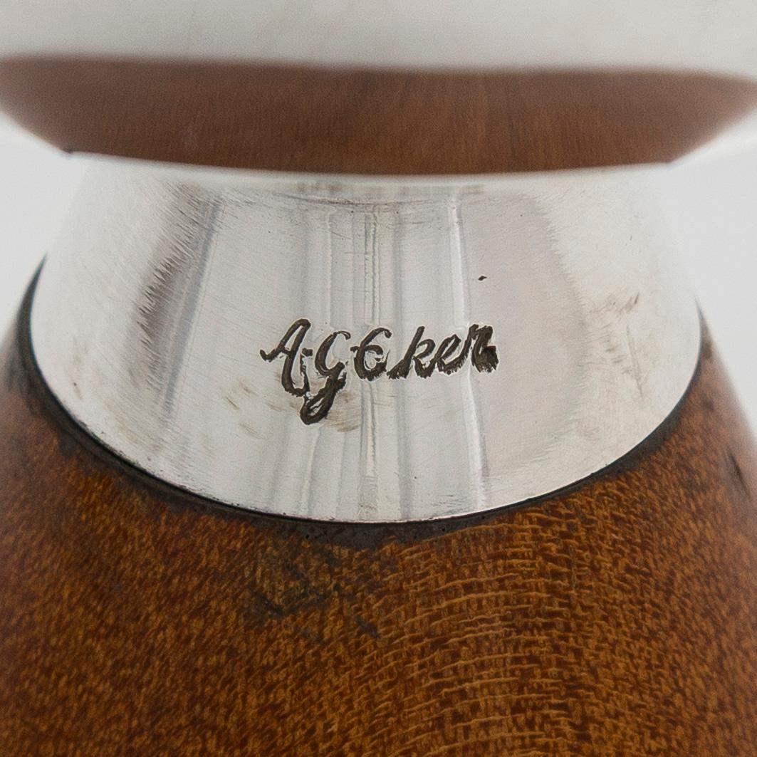 Anna-Greta Eker, a silevr cream jug and sugar bowl on a mahogany base, Auran Kultaseppä, Turku 1962.