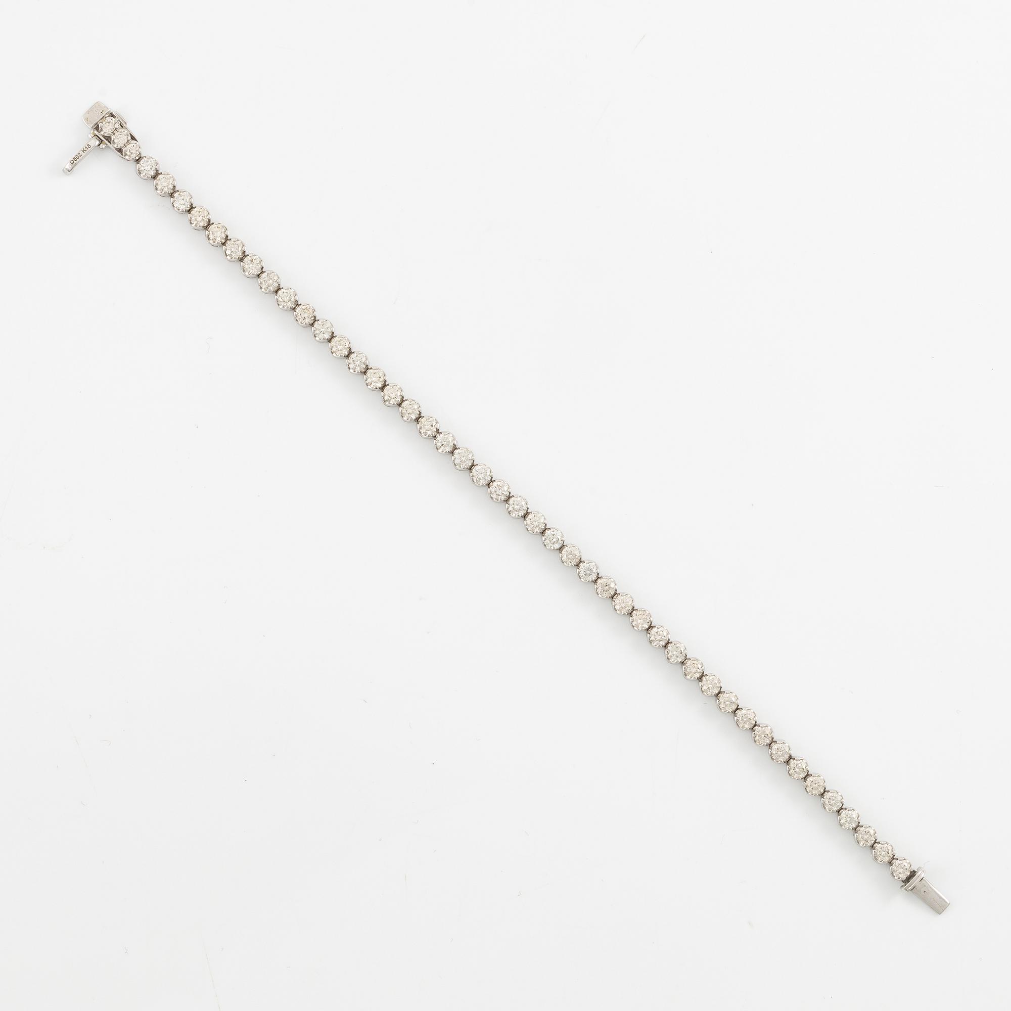 Tennis bracelet 18K white gold with brilliant-cut diamonds.