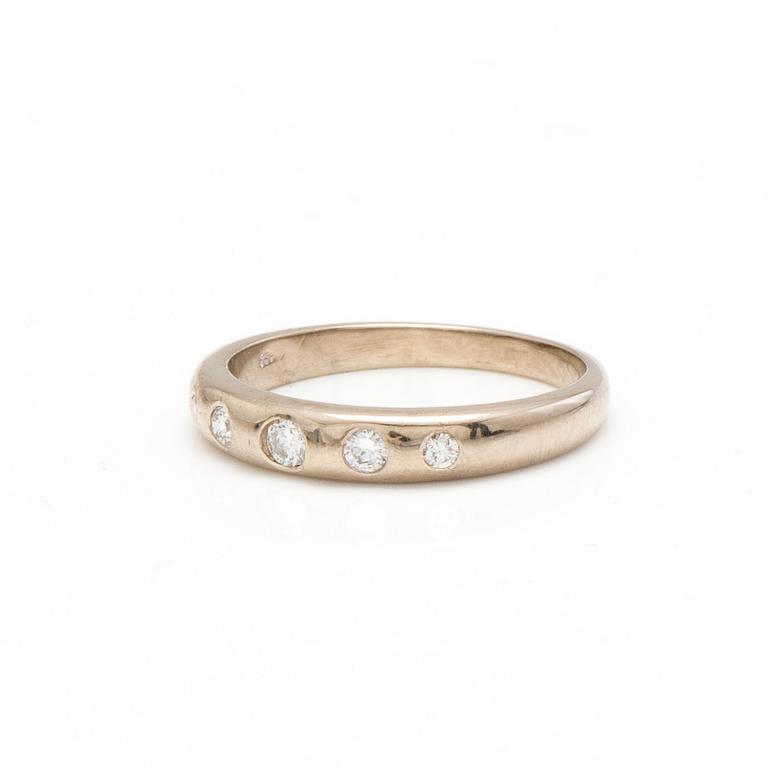 A 14K white gold ring with diamonds ca. 0.15 ct in total. Estetika Oy, Helsinki 2000.