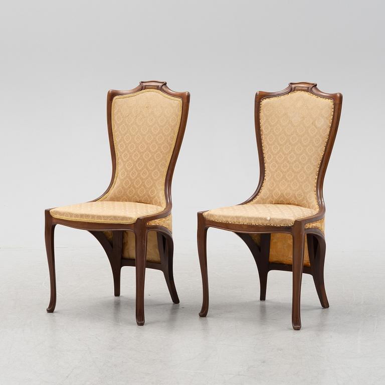 A pair of mahogany art nouveau chairs by Edward Colonna for Samuel Bing, Paris, early 20th Century.