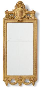 84. A Gustavian giltwood mirror by J. Åkerblad (master in Stockholm 1758-99).