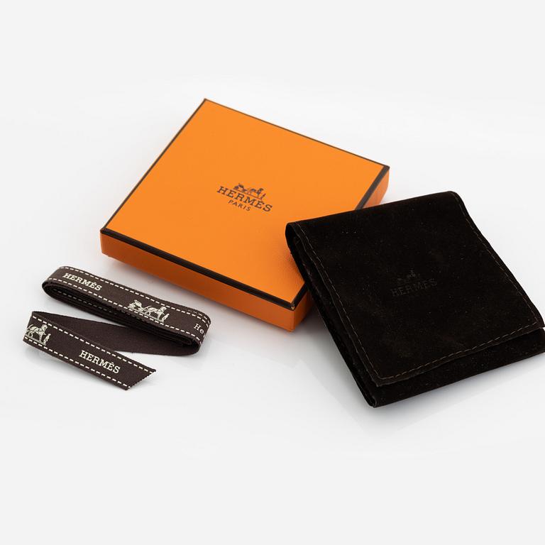 Hermès, bangle, "Clic H PM", silver coloured metal and white enamel.