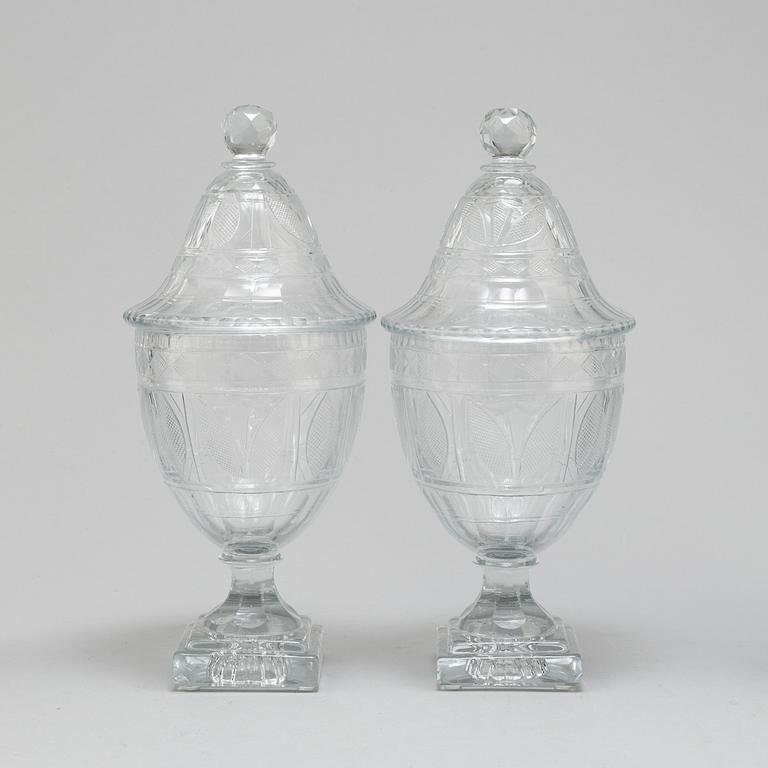 A pair of late 19th century lidded glass cups.