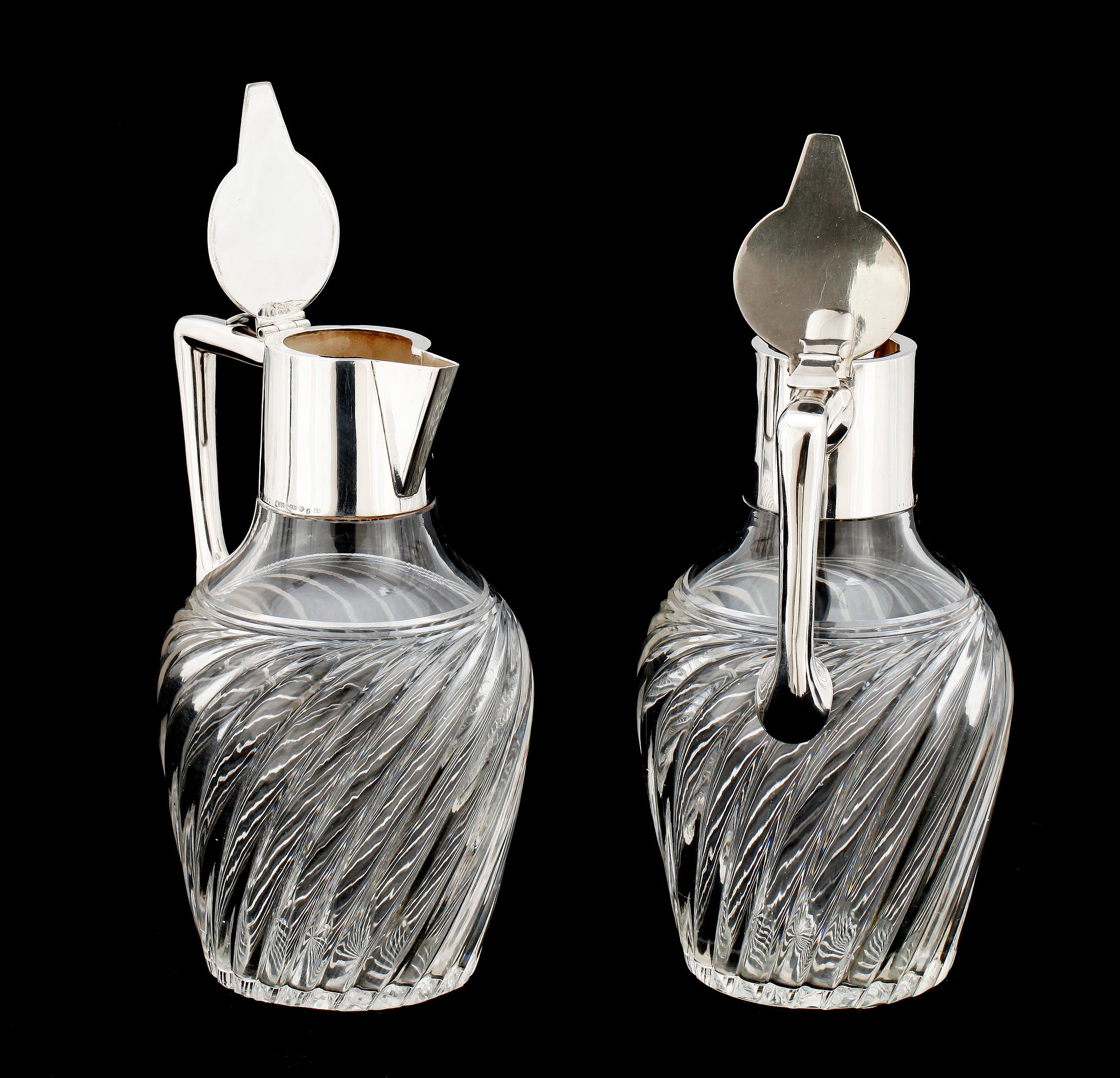 KANNOR, ett par, silver glas, Koch & Bergfeldt, Bremen resp C F Carlman, 1888.