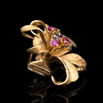 BROSCH, fasettslipade rubiner och safirer, 18K guld. Frankrike.