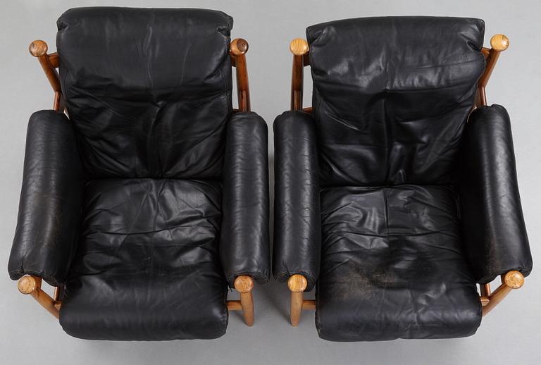 A pair of 'Amiral' easy chair by Eric Merthen.