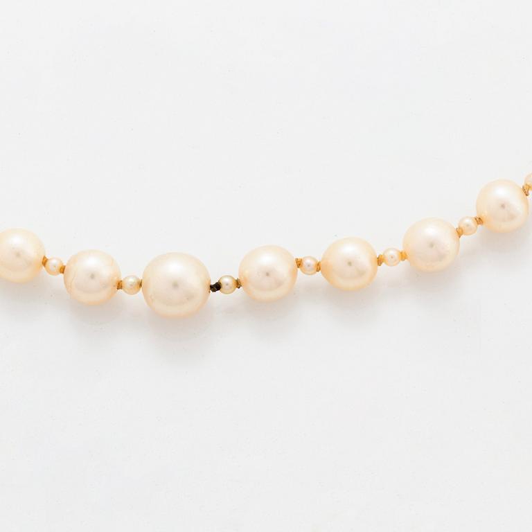 A cultured pearl necklace with a WA Bolin clasp.