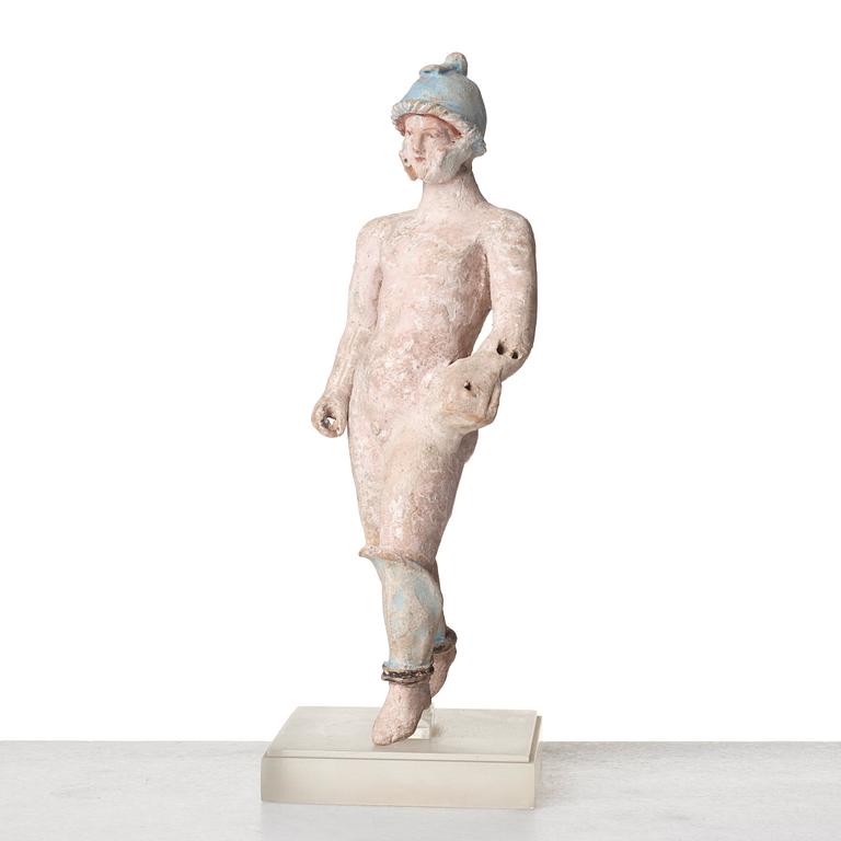 A Greek terracotta sculpture of a warrior, Hellenistic period, Canosa, 3rd Century B.C.