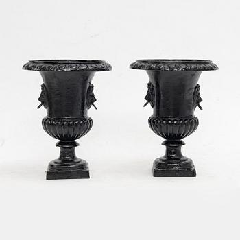 Garden urns, a pair, cast iron, 20th century.