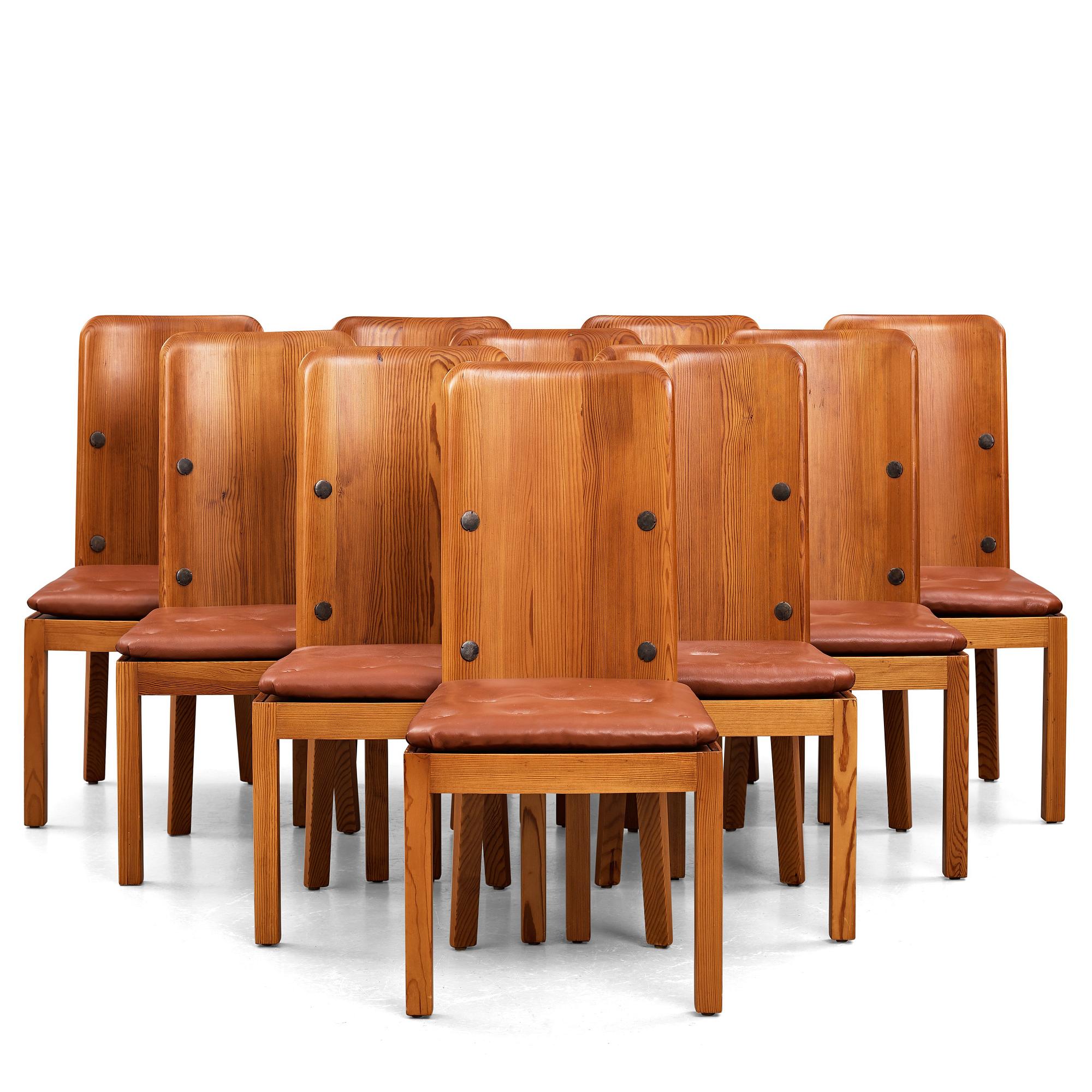Axel Einar Hjorth, a set of ten "Lovö" stained pine dining chairs, Nordiska Kompaniet, Sweden 1930's.