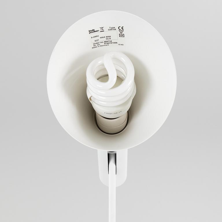 ARNE JACOBSEN, a "AJ" floor light for Louis Poulsen.
