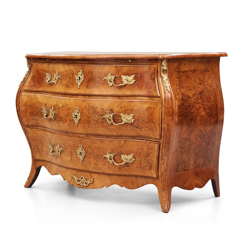 A burr-alder and gilt brass-mounted rococo commode by J. Sjölin (master 1767-85).