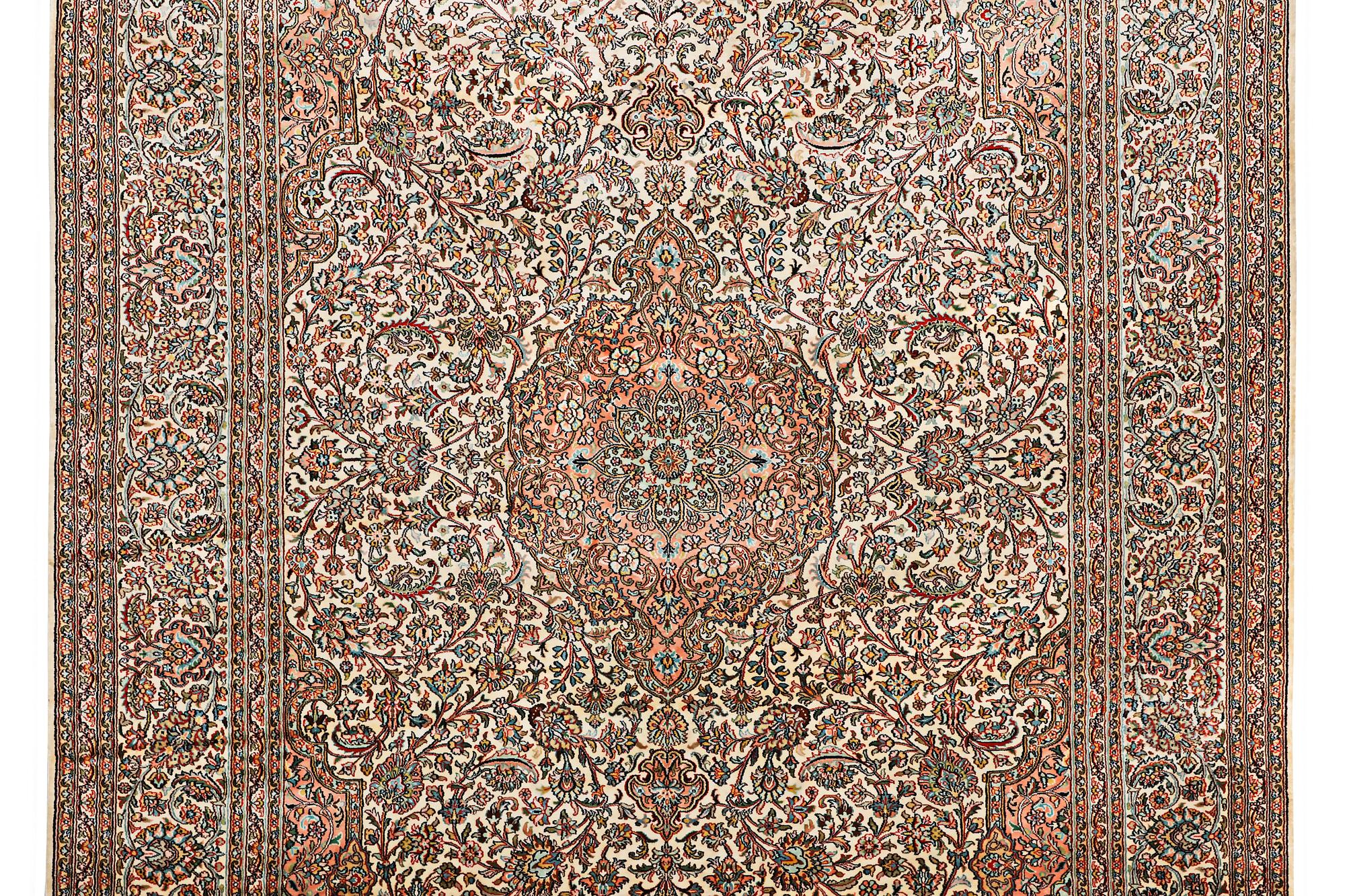 A carpet, silk Kashmir, ca 303 x 216 cm.
