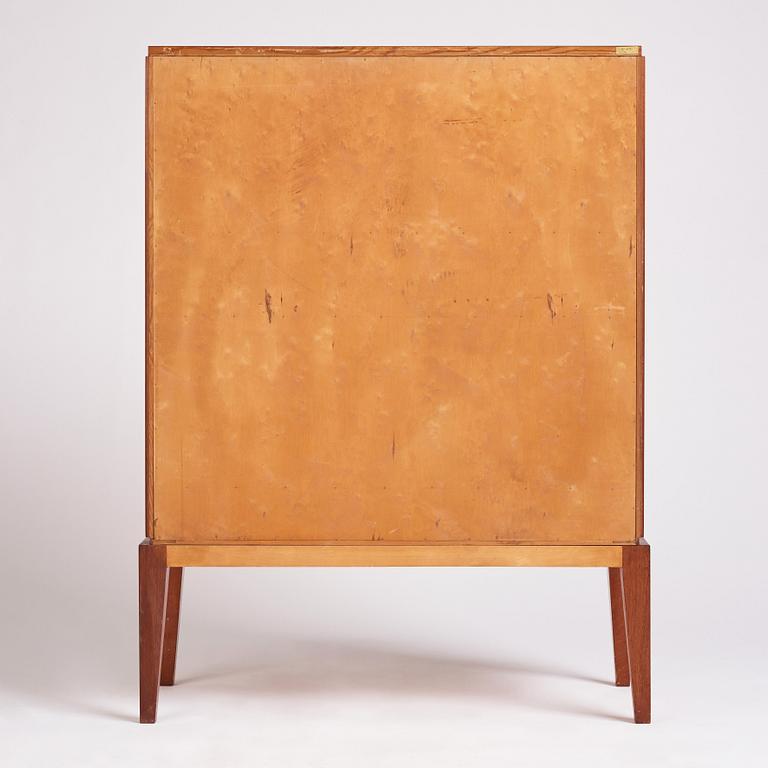 Erik Mattsson, "Stockholm 1", a cabinet, ed. 12/12, executed by Birger Ekman, Mjölby Intarsia for AB Harry Carlsson Stockholm, 1944.