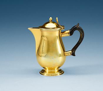 809. A Russian 19th century silver-gilt coffee-pot, makers mark of Alexander Jaschinkov, St. Petersburg 1805.