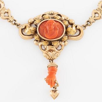 Necklace in 14K gold with carved coral. Probably around the turn of the century 1900.