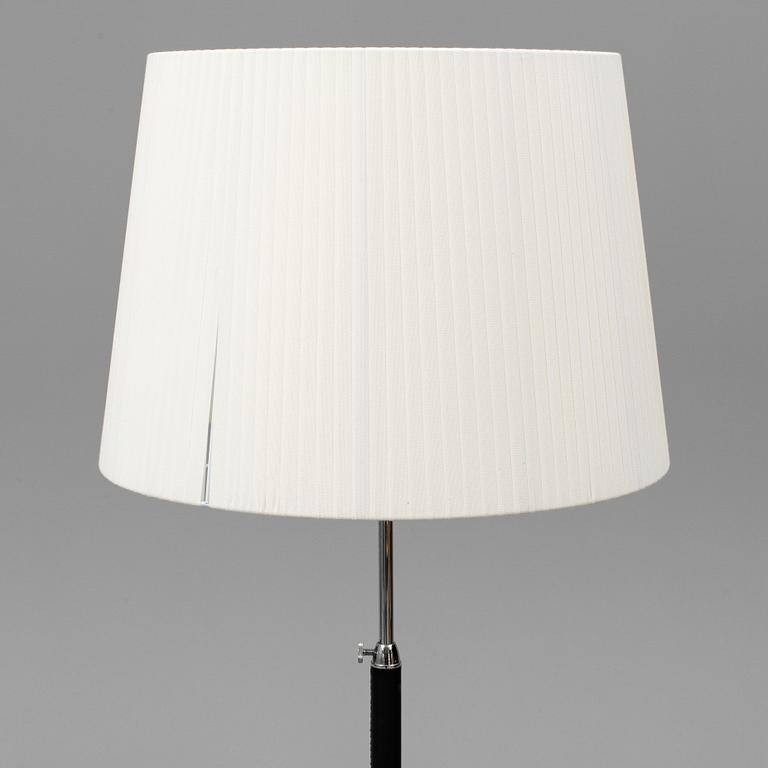 Three contemporary floorlamps by Santa & Cole.