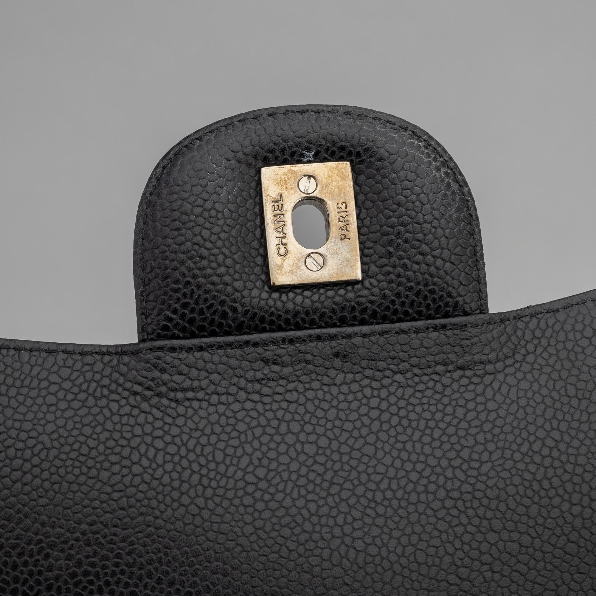 Chanel, a black caviar leather 'Double Flap Bag Jumbo', 2011.