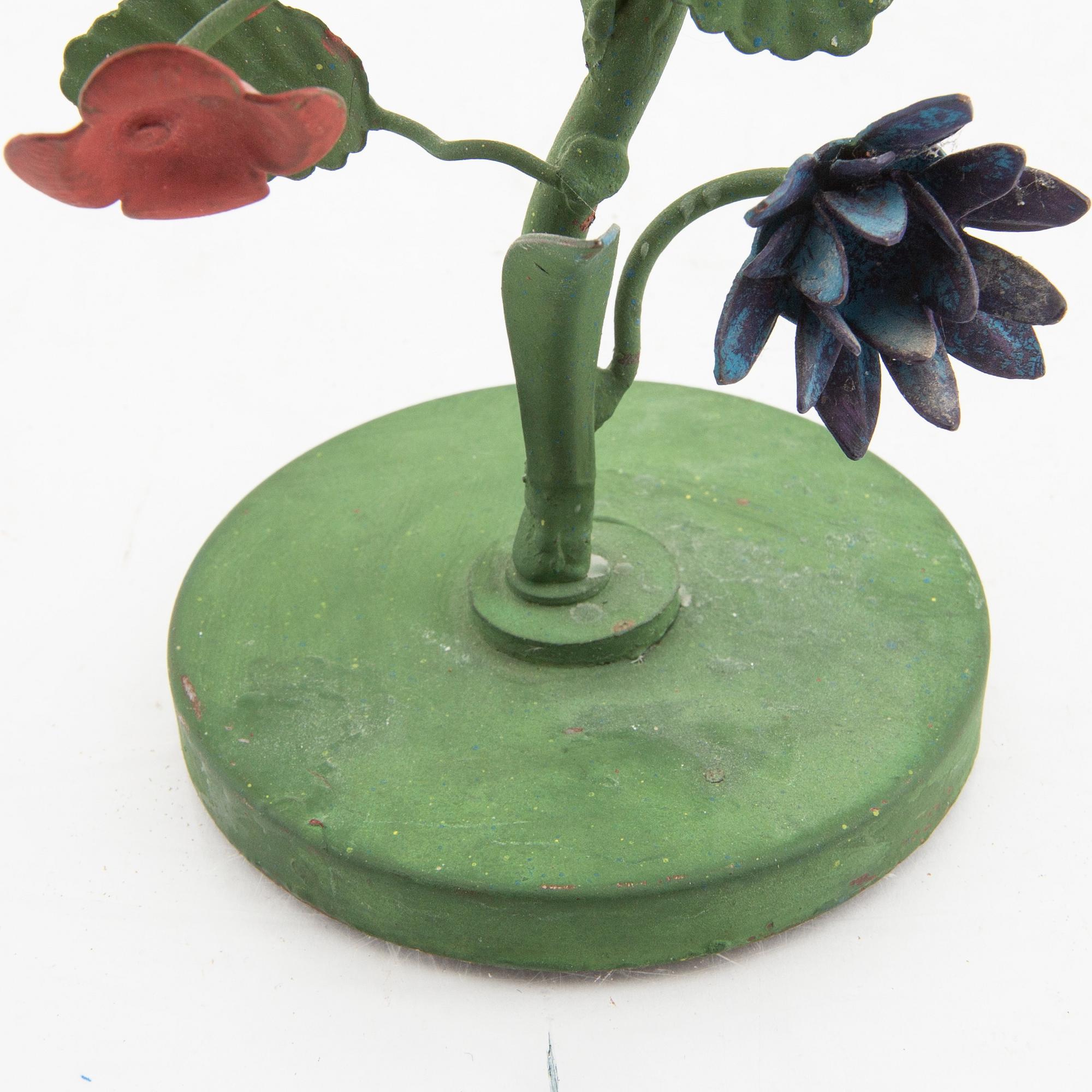 Firma Svenskt Tenn, a painted metal candlestick.