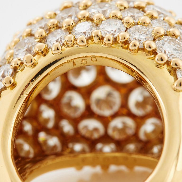 Cartier "Marrakech" an 18K gold bombé ring set with round brilliant-cut diamonds.