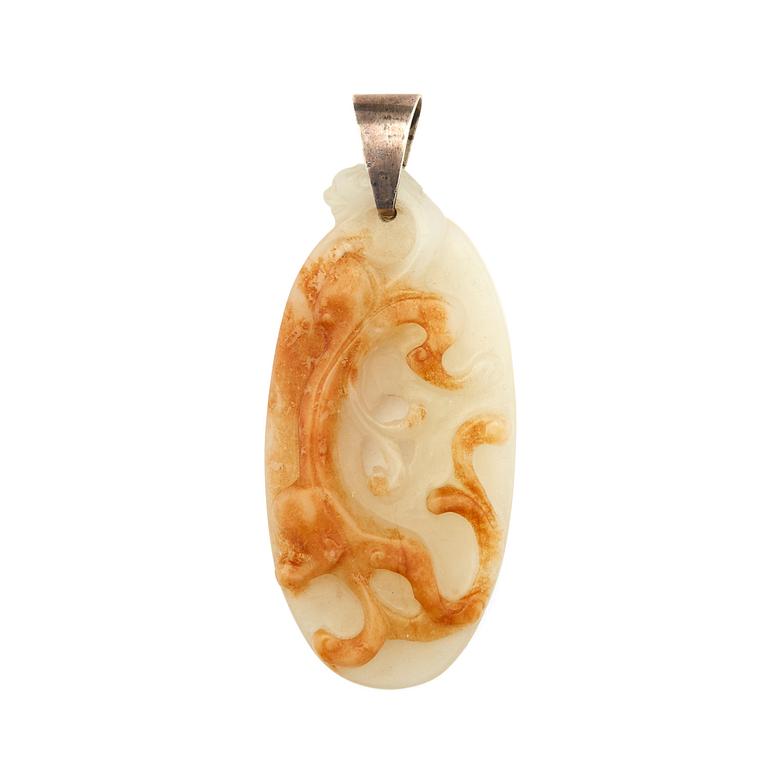 A nephrite pendant with a carved qilin, late Qing dynasty.