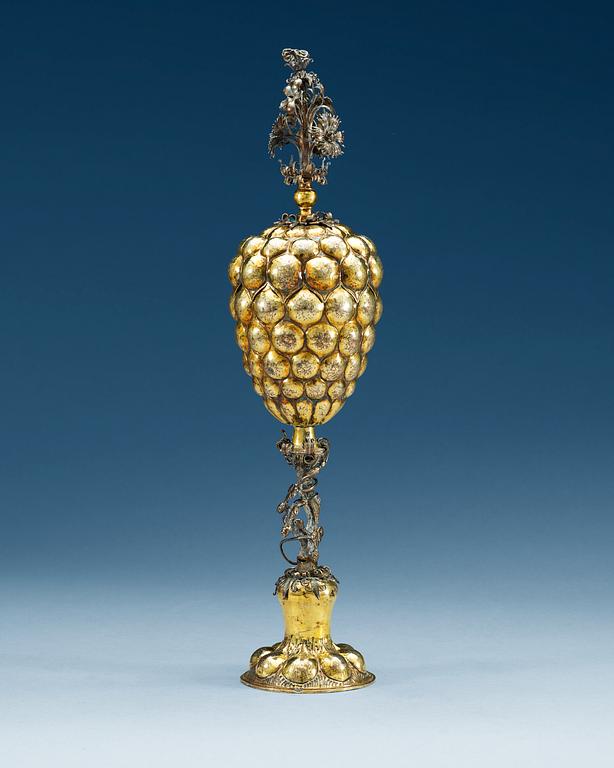 A German 17th century parcel-gilt cup and cover, makers mark of Michael Müller, Nürnberg (1612-1650).