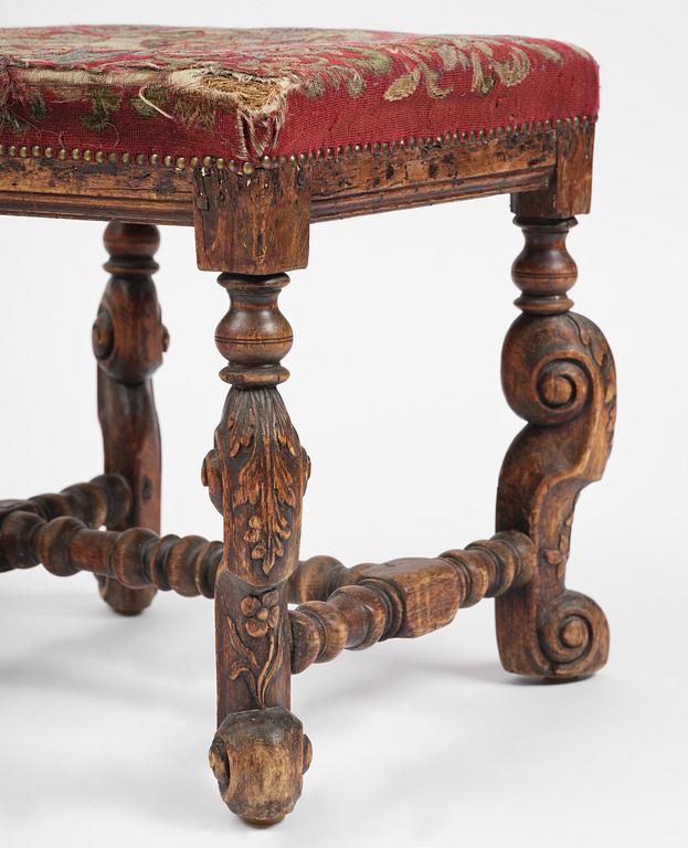 A pair of Swedish carved Baroque stools, circa 1700.