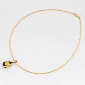 An 18K enamelled Fabergé pendant.