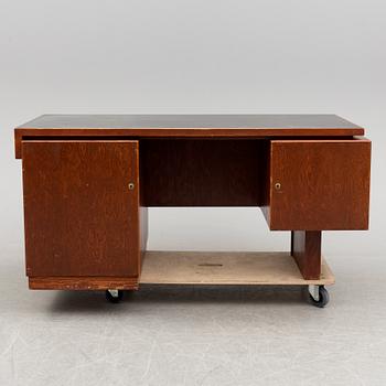 A stained desk, 1940's.