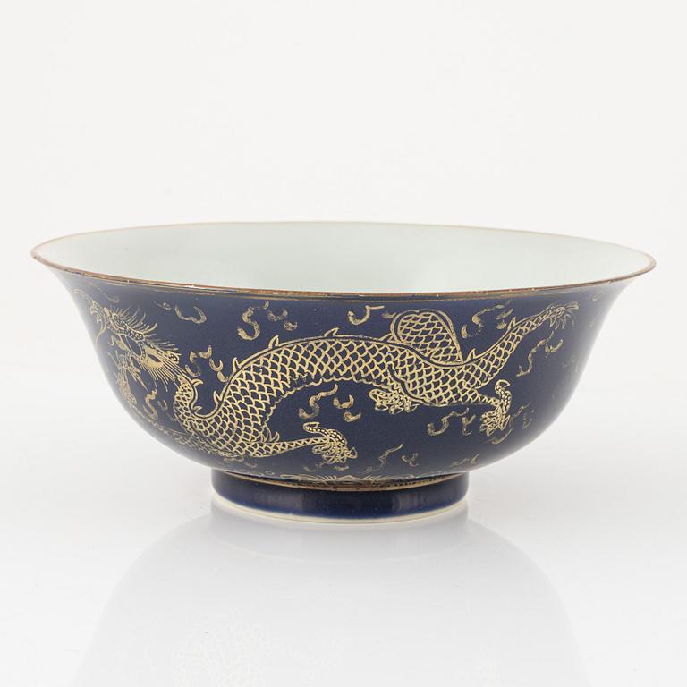 A Chinese bowl decorated with five clawed dragons, Qing dynasty with Qianlong mark.