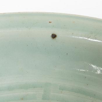 A Chinese celadon dish, Ming dynasty (1368-1644).