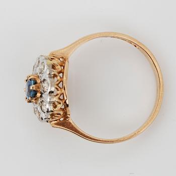 RING, 14K guld med safir ca 6x4 mm och diamanter tot ca 0,4 ct, Finland . Vikt 3, 1 g.