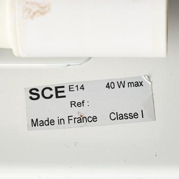 Charlotte Perriand, a pair of wall lights model "CP1", La Société Centrale d'Eclairage, France, 1960s.