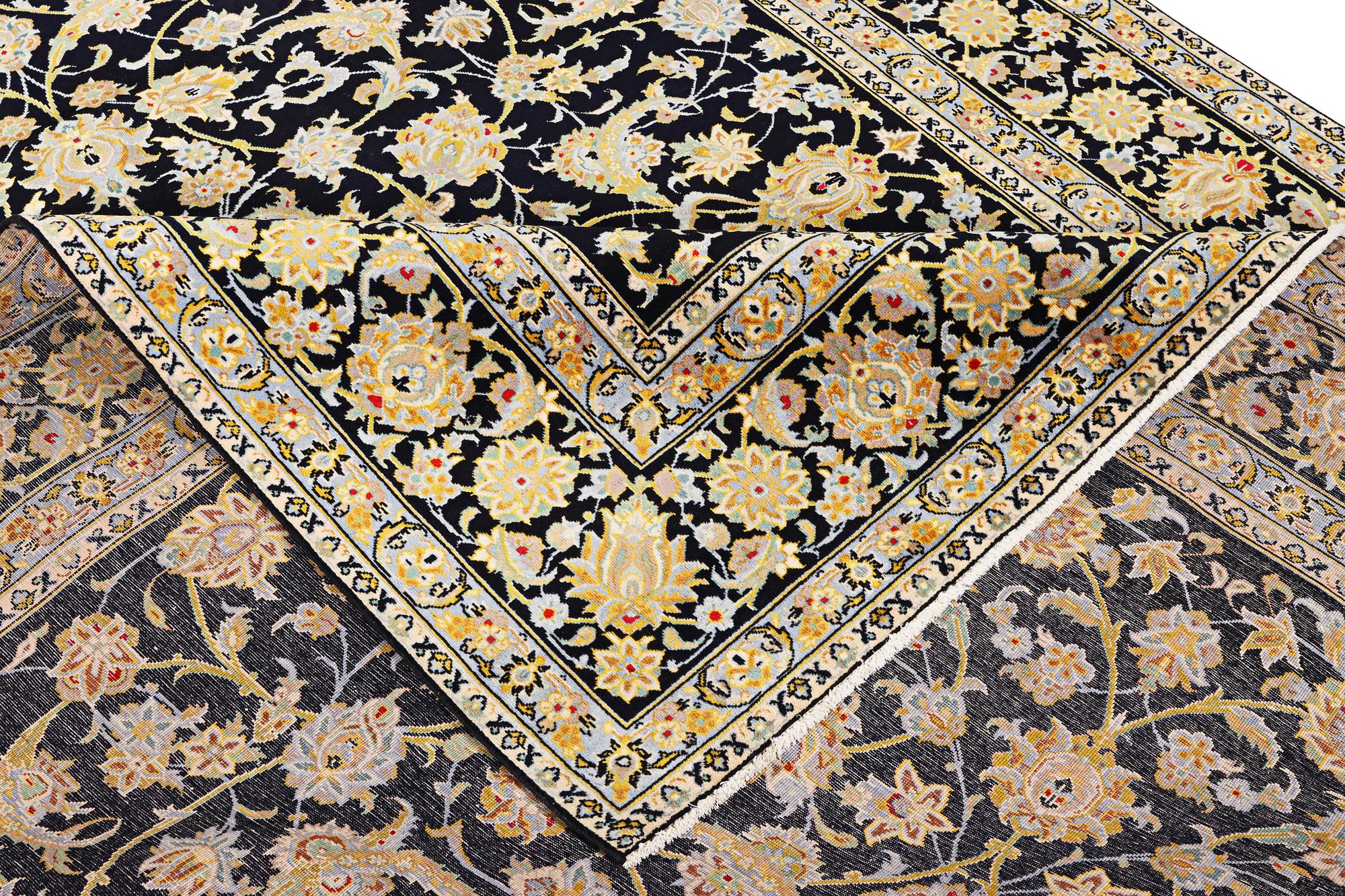 A Kashan carpet, c. 363 x 247 cm.