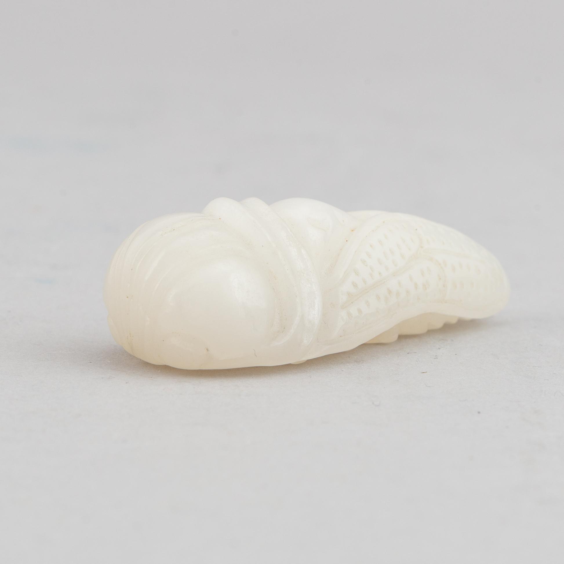 A nephrite figure of a CIKADA, China, 20th Century.