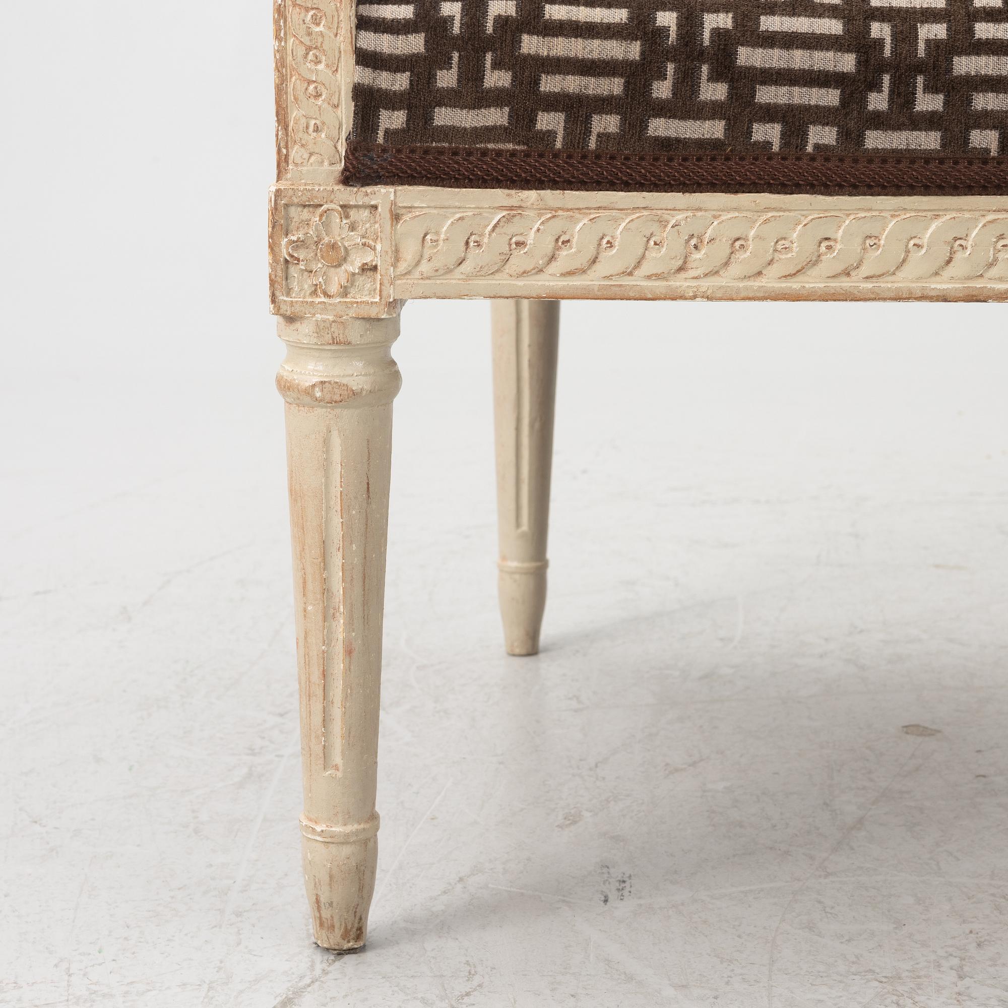 A Gustavian open armchair, Stockholm, late 18th century.