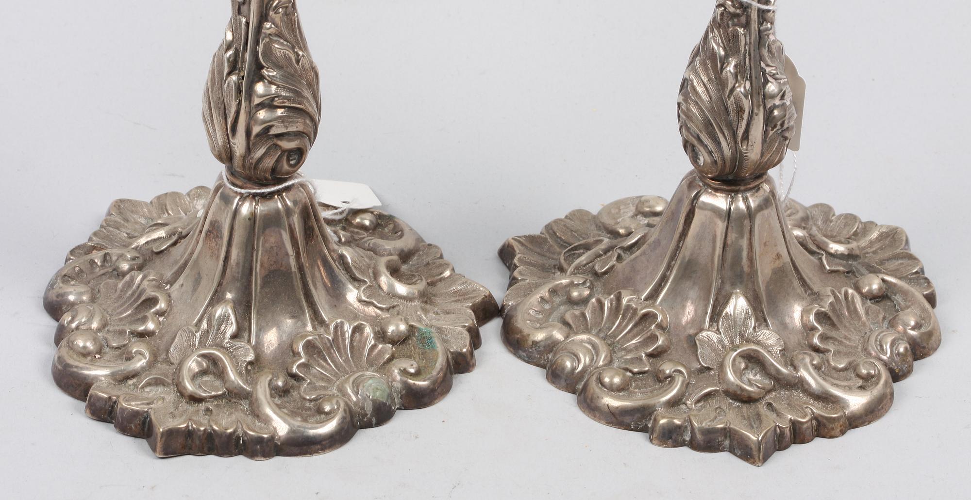 LJUSSTAKAR, ett par. Silver. Möllenborg, Stockholm 1854.
