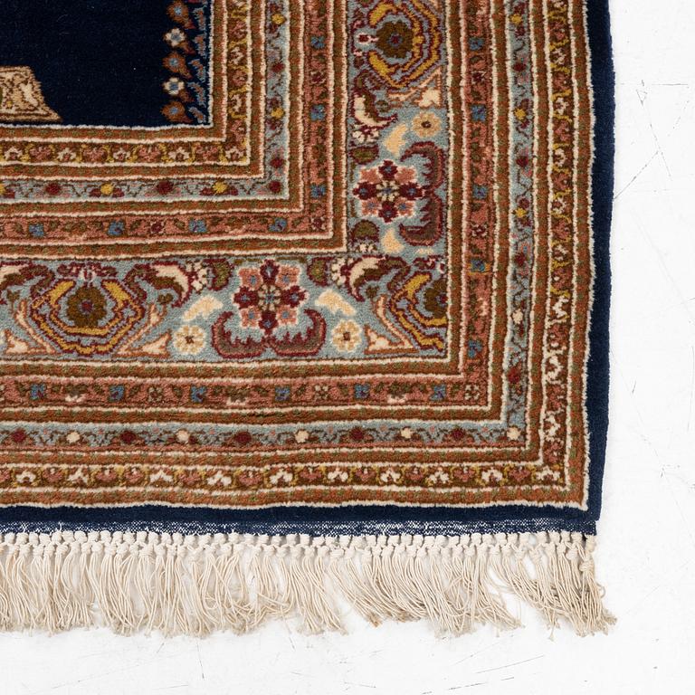 An oriental rug, c. 190 x 125 cm.