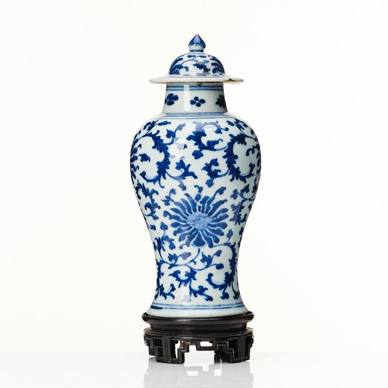 A Chinese blue and white lotus vase with cover, Qing dynasty, 18th Century.