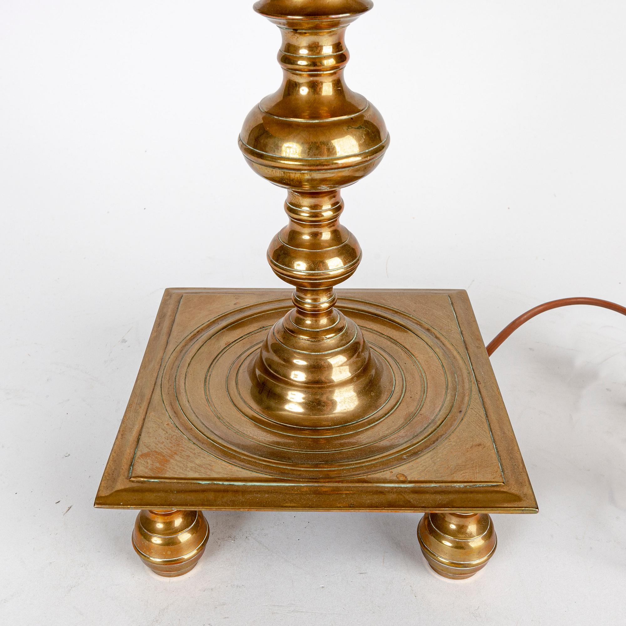 A set of two bronze 1930/40s Baroque style table lamps.