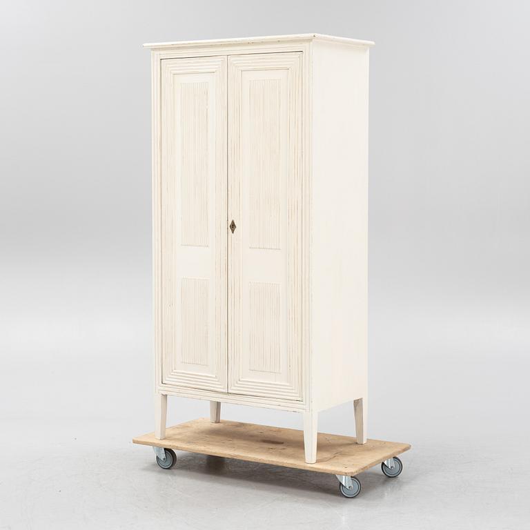 A Gustavian style cabinet, early 20th Century.