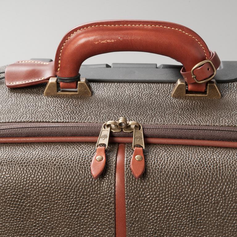 A hardsided trolley by Mulberry.