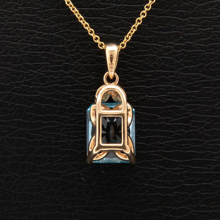 Necklace 14K gold with step-cut blue topaz and round brilliant-cut diamonds.
